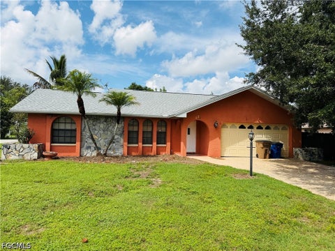 Photo of 124 Sebring Circle, Lehigh Acres, FL 33936 (MLS # 2026040321)