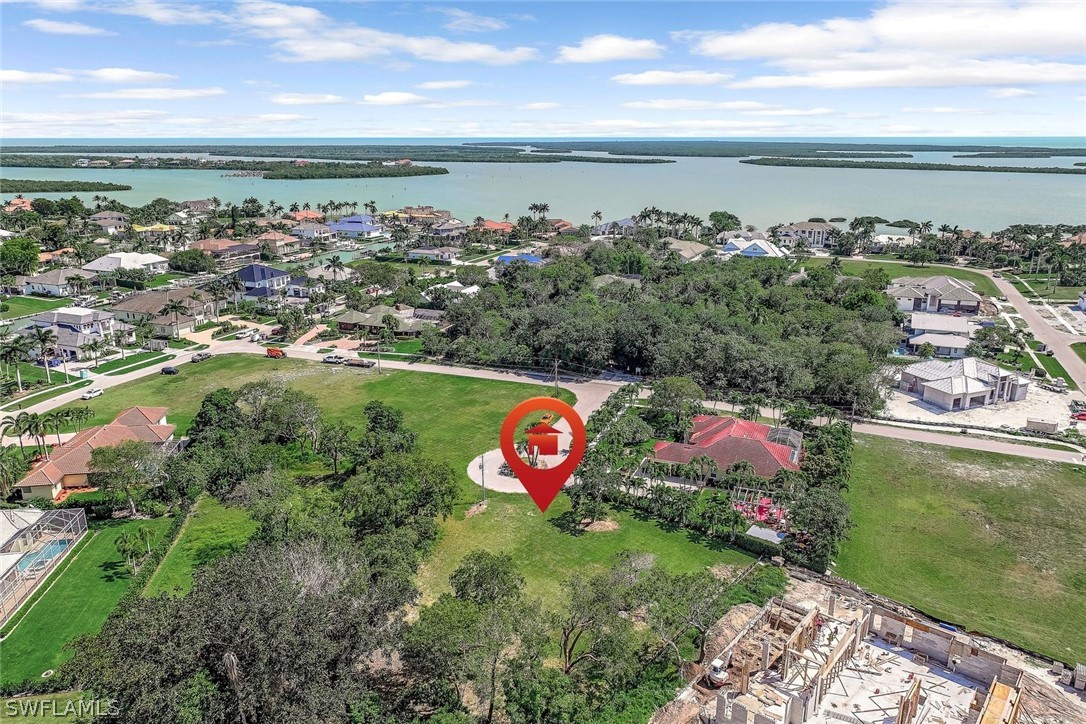 Aerial perspective of suburban area with a nearby
