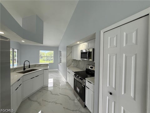 Photo of 2401 Fisher Court, Lehigh Acres, FL 33936 (MLS # 2026037923)