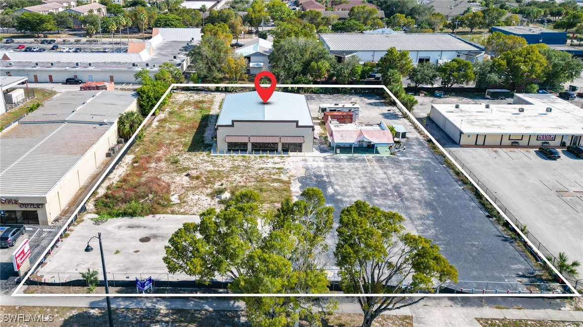 Aerial view of property and surrounding area featu