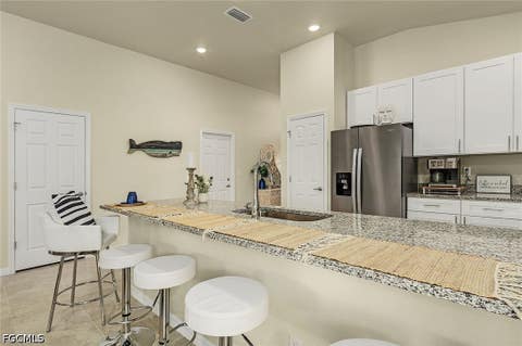 Tiny photo for 214 NW 3rd Avenue, Cape Coral, FL 33993 (MLS # 2026026874)