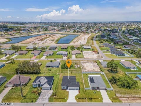 Tiny photo for 214 NW 3rd Avenue, Cape Coral, FL 33993 (MLS # 2026026874)