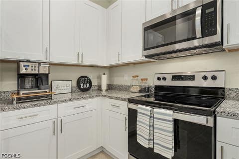 Tiny photo for 214 NW 3rd Avenue, Cape Coral, FL 33993 (MLS # 2026026874)