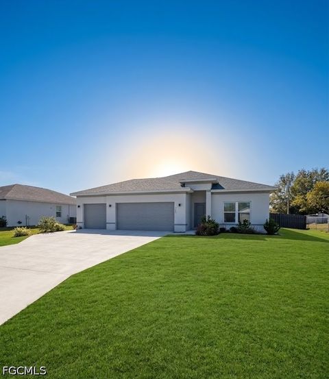 Photo of 214 NW 3rd Avenue, Cape Coral, FL 33993 (MLS # 2026026874)
