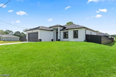 Tiny photo for 2911 38th Street W, Lehigh Acres, FL 33971 (MLS # 2026030882)