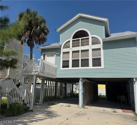 Photo of 225 Fairweather Lane, Fort Myers Beach, FL 33931 (MLS # 2026034894)