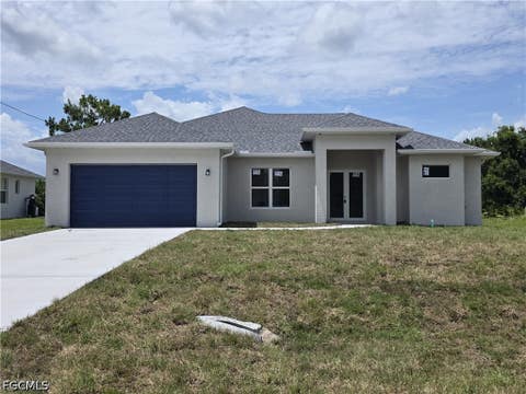 Photo of 4210 34th Street SW, Lehigh Acres, FL 33976 (MLS # 2026031154)