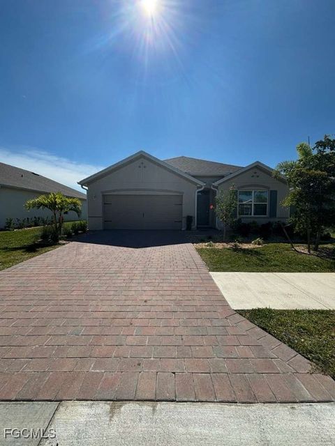 Photo of 20261 Camino Torcido Loop, North Fort Myers, FL 33917 (MLS # 2025018216)