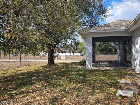 Tiny photo for 744 Burns Avenue S, Lehigh Acres, FL 33974 (MLS # 2026014234)