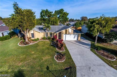 Photo of 17433 Fuchsia Road, Fort Myers, FL 33967 (MLS # 2026035161)