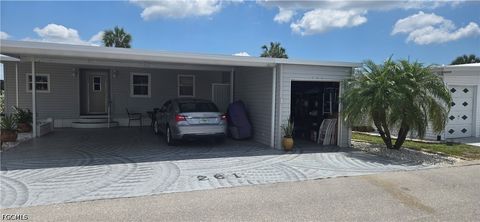Photo of 261 Palmer Boulevard, North Fort Myers, FL 33903 (MLS # 2026020077)