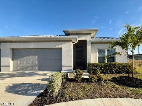Photo of 500 NE 16th Terrace, Cape Coral, FL 33993 (MLS # 2026020298)
