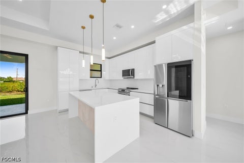 Tiny photo for 908 NE 11th Avenue, Cape Coral, FL 33909 (MLS # 2026036661)