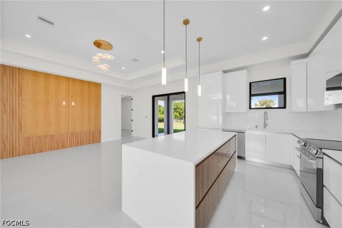 Tiny photo for 908 NE 11th Avenue, Cape Coral, FL 33909 (MLS # 2026036661)