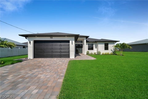 Photo of 908 NE 11th Avenue, Cape Coral, FL 33909 (MLS # 2026036661)