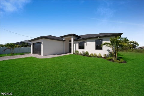 Tiny photo for 908 NE 11th Avenue, Cape Coral, FL 33909 (MLS # 2026036661)