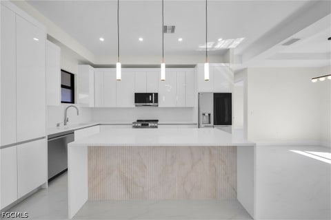 Tiny photo for 908 NE 11th Avenue, Cape Coral, FL 33909 (MLS # 2026036661)