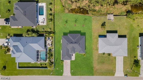Tiny photo for 908 NE 11th Avenue, Cape Coral, FL 33909 (MLS # 2026036661)