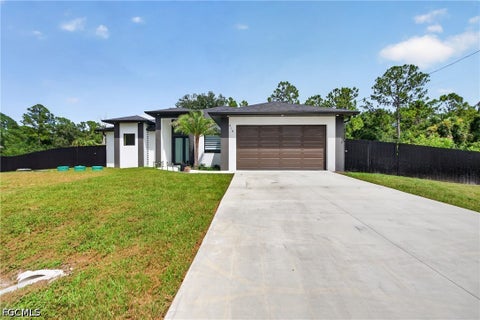 Photo of 414 Highland Avenue, Lehigh Acres, FL 33972 (MLS # 2026036949)