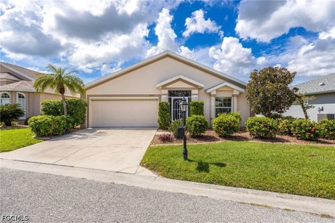 Photo of 24419 Buckingham Way, Port Charlotte, FL 33980 (MLS # 2026042242)
