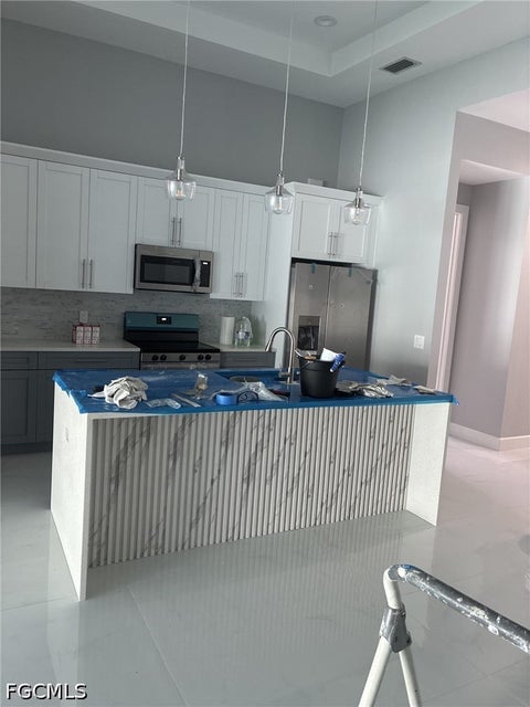 Tiny photo for 908 NE 8th Place, Cape Coral, FL 33909 (MLS # 2026039316)