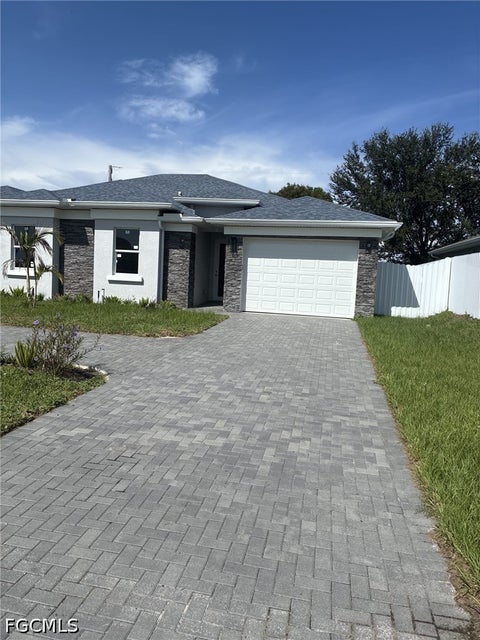 Photo of 908 NE 8th Place, Cape Coral, FL 33909 (MLS # 2026039316)