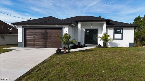 Photo of 3004 4th Street SW, Lehigh Acres, FL 33976 (MLS # 2026037438)