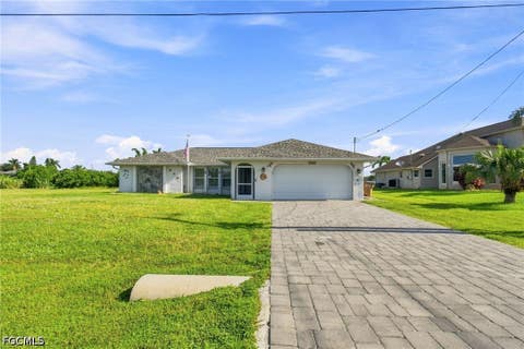 Photo of 1133 SW 13th Street, Cape Coral, FL 33991 (MLS # 2026035057)