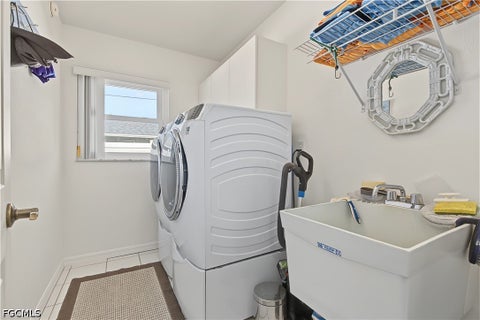 Tiny photo for 606 SE 15th Street, Cape Coral, FL 33990 (MLS # 2026038278)