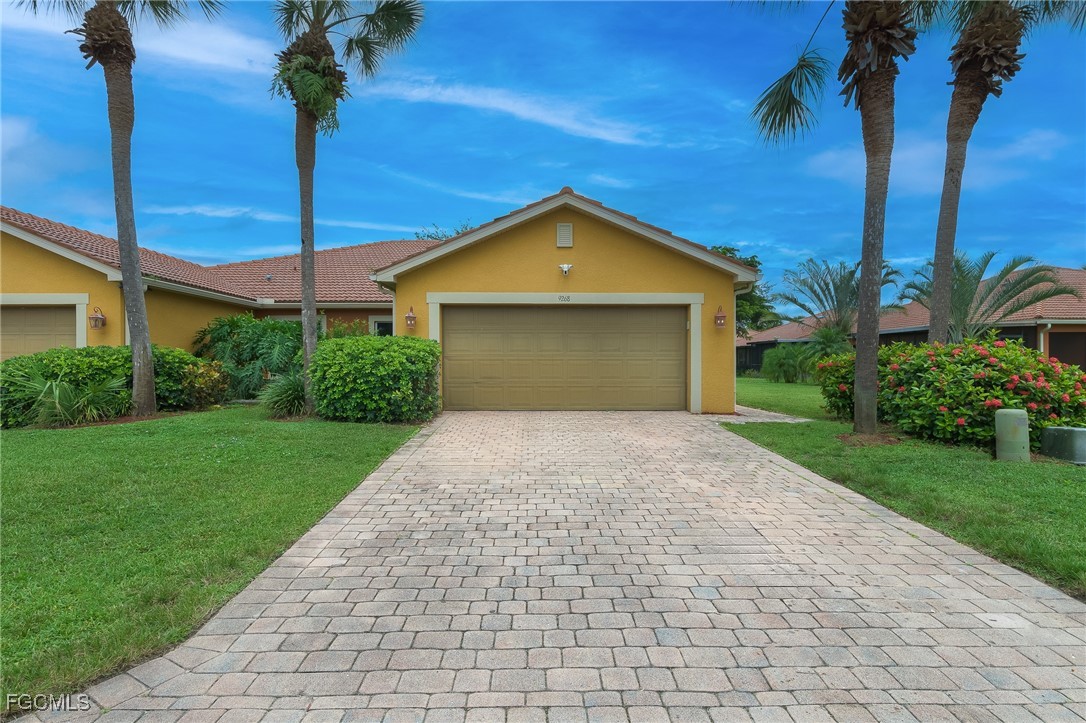 Ranch-style house featuring stucco siding, decorat