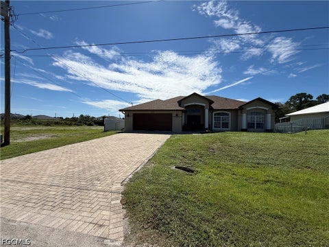 Photo of 3315 37th Street SW, Lehigh Acres, FL 33976 (MLS # 2026043028)