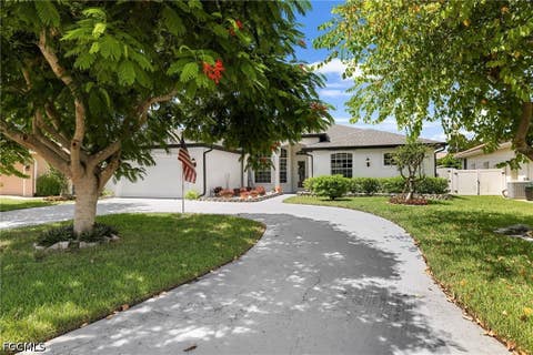Photo of 1819 SE 19th Lane, Cape Coral, FL 33990 (MLS # 2026035434)