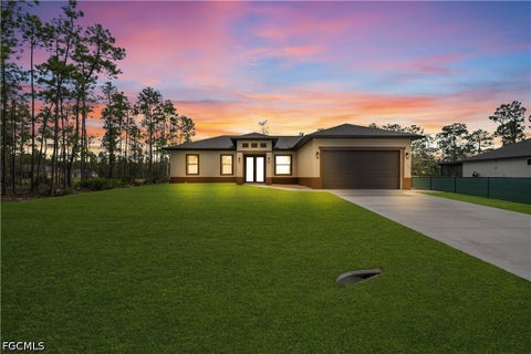 Photo of 1306 Broadway Avenue, Lehigh Acres, FL 33972 (MLS # 2026042892)