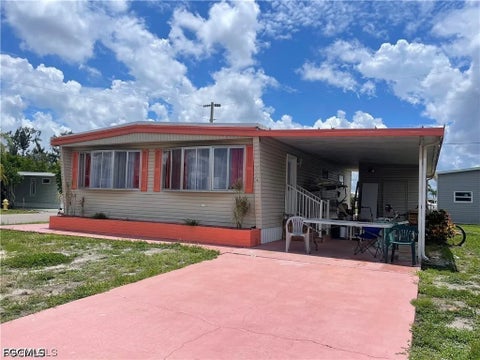 Photo of 5524 Sir Walter Way, North Fort Myers, FL 33917 (MLS # 2026031009)