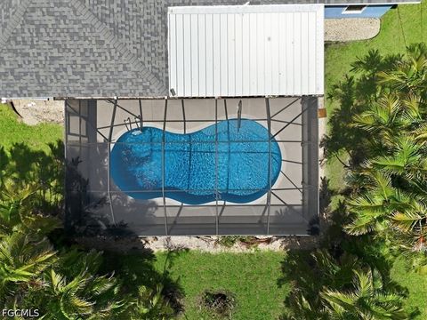Tiny photo for 801 SW 11th Place, Cape Coral, FL 33991 (MLS # 2026023173)