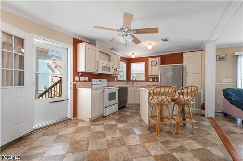 Tiny photo for 3908 Coconut Drive, St James City, FL 33956 (MLS # 2026018671)