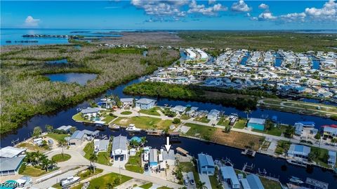 Tiny photo for 3908 Coconut Drive, St James City, FL 33956 (MLS # 2026018671)