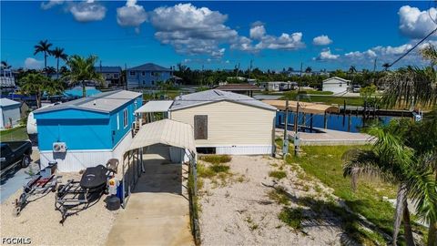 Tiny photo for 3908 Coconut Drive, St James City, FL 33956 (MLS # 2026018671)