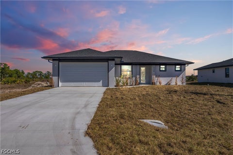 Photo of 6002 Sara Avenue N, Lehigh Acres, FL 33971 (MLS # 2026043022)