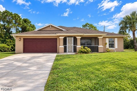 Photo of 1900 Xelda Avenue N, Lehigh Acres, FL 33971 (MLS # 2026040935)