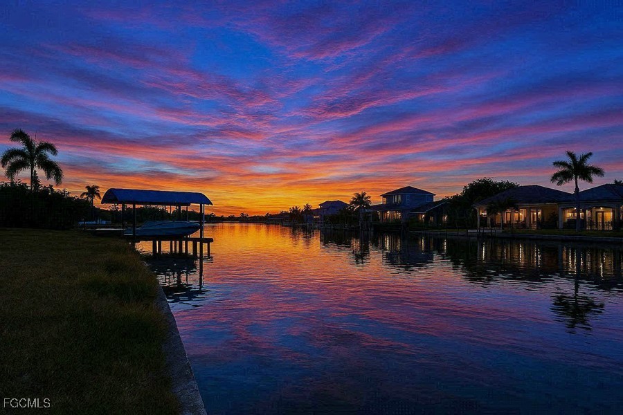 Water view with a dock