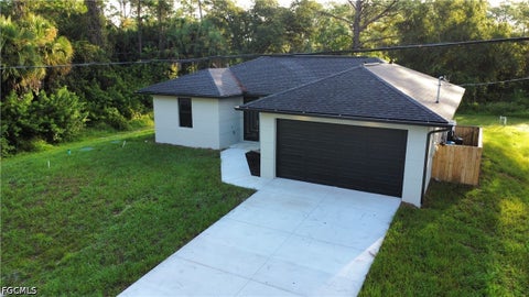 Photo of 173 Blakely Avenue S, Lehigh Acres, FL 33974 (MLS # 2026041134)