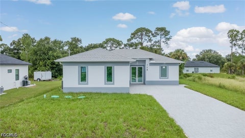 Photo of 758 Bianca Avenue S, Lehigh Acres, FL 33974 (MLS # 2026038396)