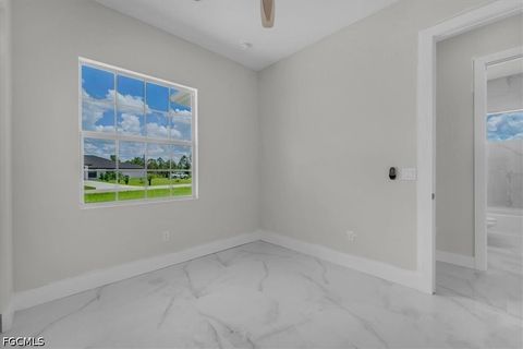 Tiny photo for 1911 Richmond Avenue N, Lehigh Acres, FL 33972 (MLS # 2026023211)