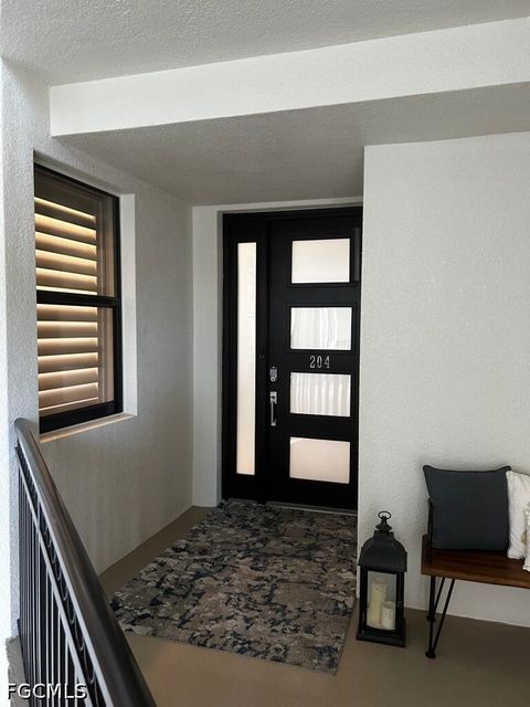 Photo of 11640 Court Of Palms #204, Fort Myers, FL 33908 (MLS # 2026022633)