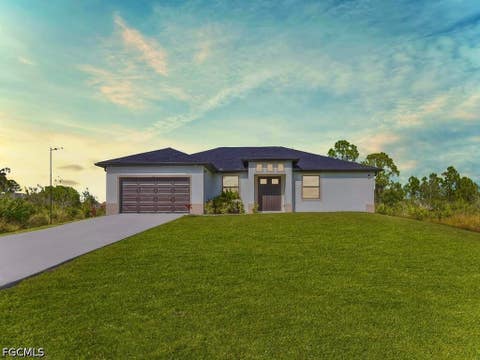 Photo of 637 Cardinal Street E, Lehigh Acres, FL 33974 (MLS # 2026030875)