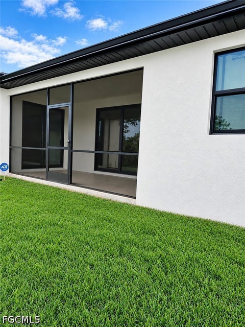 Tiny photo for 637 Cardinal Street E, Lehigh Acres, FL 33974 (MLS # 2026030875)
