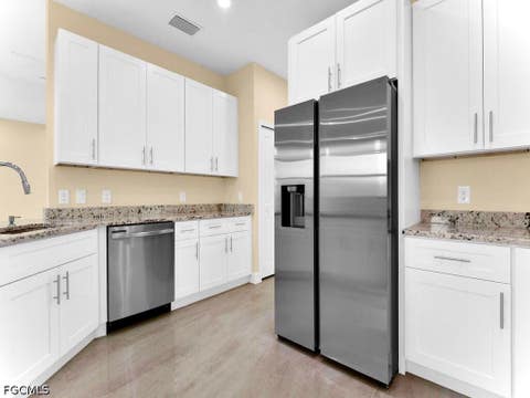 Tiny photo for 637 Cardinal Street E, Lehigh Acres, FL 33974 (MLS # 2026030875)