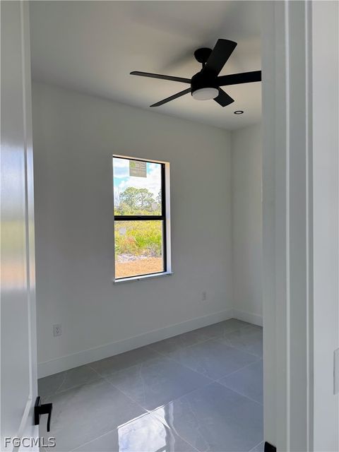 Tiny photo for 459 Lockport Avenue S, Lehigh Acres, FL 33974 (MLS # 2026012288)