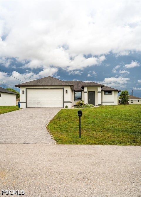 Photo of 2917 5th Street SW, Lehigh Acres, FL 33976 (MLS # 2026037015)